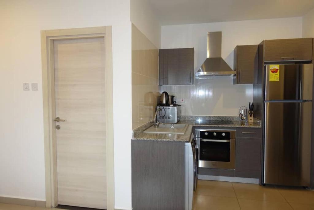 The Gallery Luxury Suites Cpg Іст-Легон Екстер'єр фото