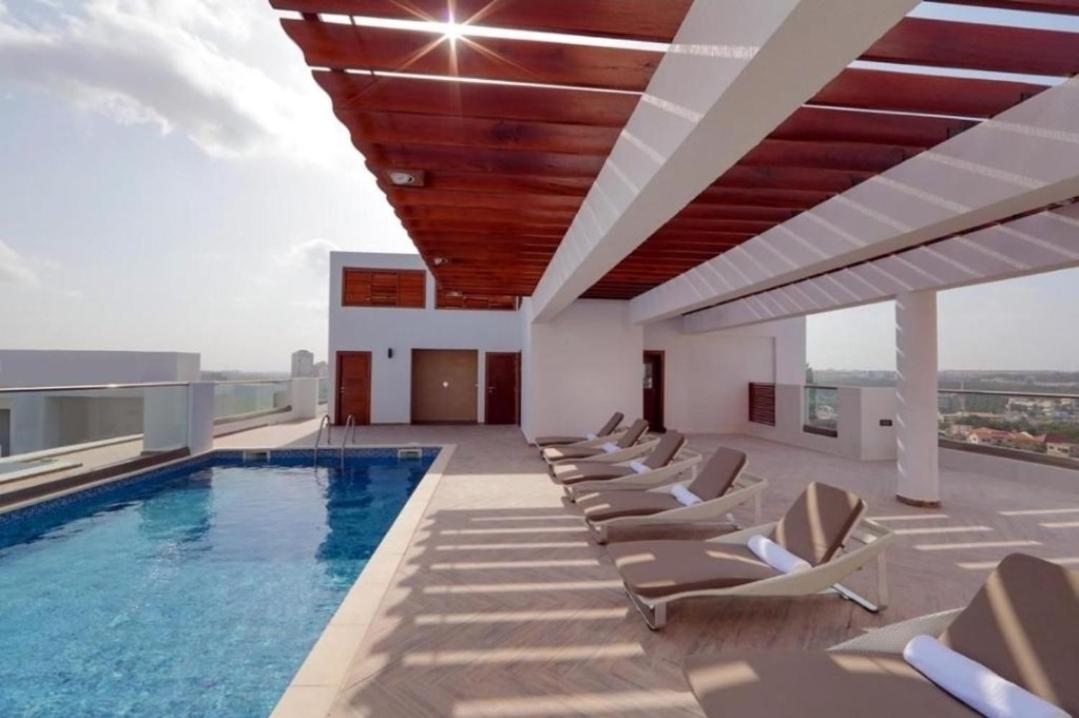 The Gallery Luxury Suites Cpg Іст-Легон Екстер'єр фото